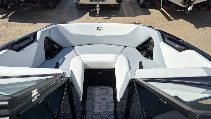 Slide: The Image of Interior of 2025 MasterCraft NXT20 with white upholstery. - 28