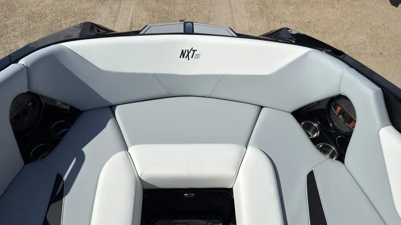Slide: The Image of Interior of 2025 MasterCraft NXT20 with gray upholstery. - 31