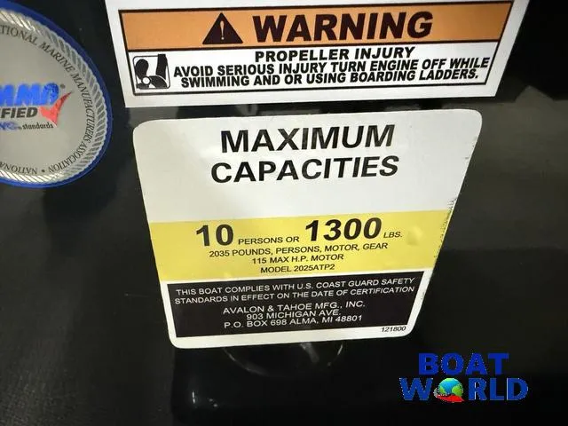 Slide: The Image of 2025 Tahoe Sport 2185 boat capacity warning label, max 10 persons or 1300 lbs, 115 HP motor. - 17