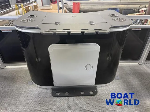 Slide: The Image of 2025 Tahoe Sport 2185 Rear Fish boat console with storage compartment, showcased at Boat World. - 23