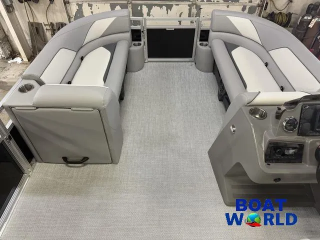 Slide: The Image of 2025 Tahoe Sport 2185 Rear Fish interior with gray seating and modern console. - 26