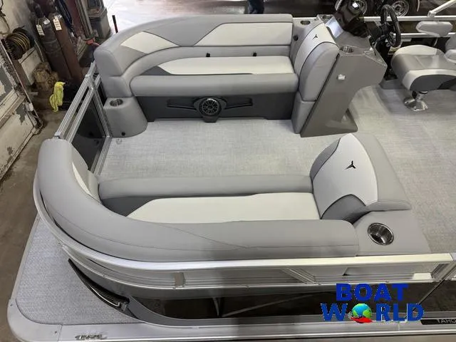 Slide: The Image of 2025 Tahoe Sport 2185 Rear Fish interior with gray seating and steering console. - 3