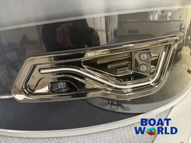 Slide: The Image of 2025 Tahoe Sport 2185 boat detail with modern design and lighting, Boat World logo visible. - 32