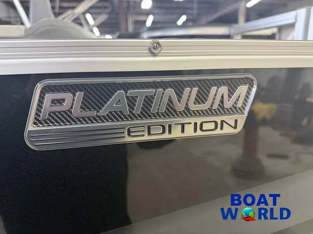 Slide: The Image of 2025 Tahoe Sport 2185 Platinum Edition boat badge at Boat World showroom. - 36