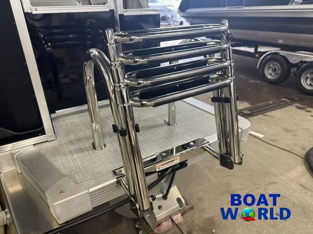 Slide: The Image of 2025 Tahoe Sport 2185 boat ladder, chrome finish, displayed at Boat World showroom. - 39