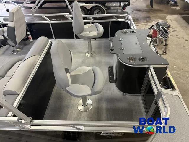 Slide: The Image of 2025 Tahoe Sport 2185 Rear Fish boat interior with seating and fishing station. - 5