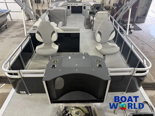 Slide: The Image of 2025 Tahoe Sport 2185 Rear Fish boat interior with seating and console, showcased at Boat World. - 6