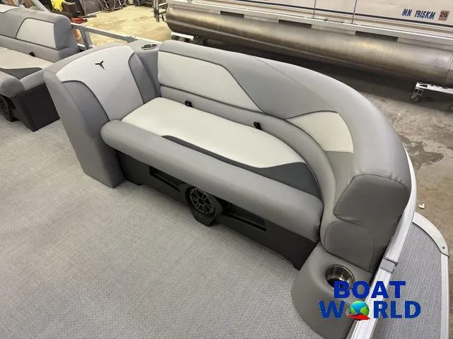 Slide: The Image of 2025 Tahoe Sport 2185 boat interior with gray seating and cup holders. - 9