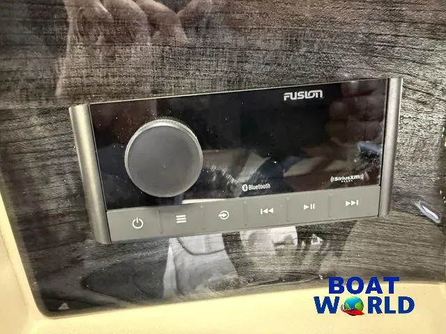 Slide: The Image of Fusion audio system on 2025 Tahoe LTZ 2385 Elite Cruise boat dashboard. - 14