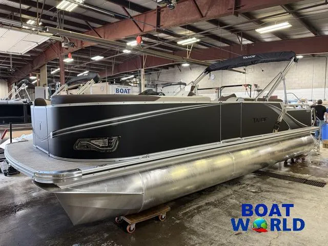 Slide: The Image of 2025 Tahoe LTZ 2385 Elite Cruise pontoon boat in showroom, featuring Honda 4-Stroke EFI engine. - 35