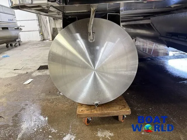 Slide: The Image of 2025 Tahoe LTZ 2385 Elite Cruise pontoon detail in a workshop setting. - 38