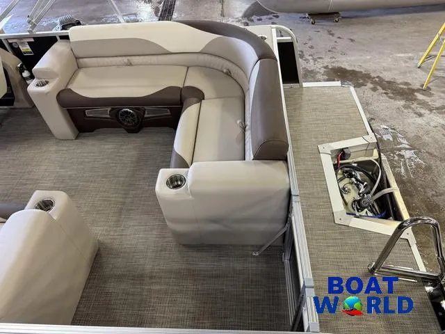 Slide: The Image of 2025 Tahoe LTZ 2385 Elite Cruise interior with Honda 4-Stroke EFI engine, featuring plush seating. - 6