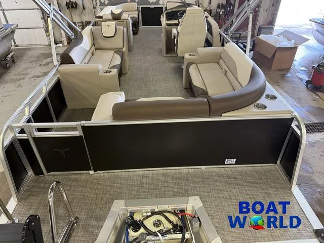 Slide: The Image of 2025 Tahoe LTZ 2385 Elite Cruise pontoon boat interior with beige seating and Honda 4-Stroke EFI. - 7