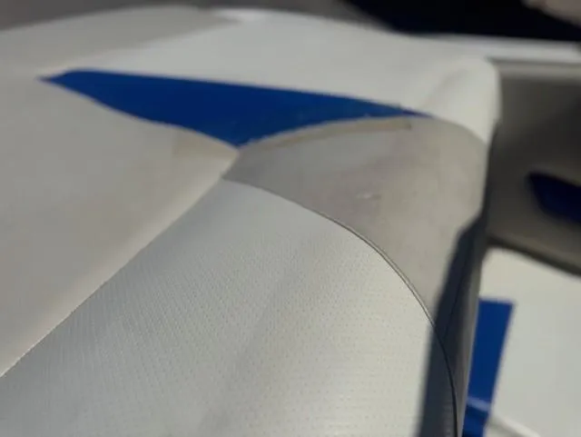 Slide: The Image of Close-up of Larson 186 SENZA 220HP 5.0 V8 boat seat upholstery, 2006 model. - 9