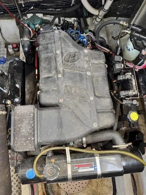 Slide: The Image of Engine compartment of a 2001 Maxum 3500 SCR boat, featuring a V8 engine. - 20