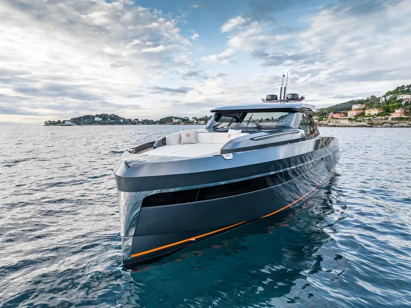 Slide: The Image of Luxurious 2023 Bekkers Yachts Azur 45HT cruising on serene waters under a cloudy sky. - 16