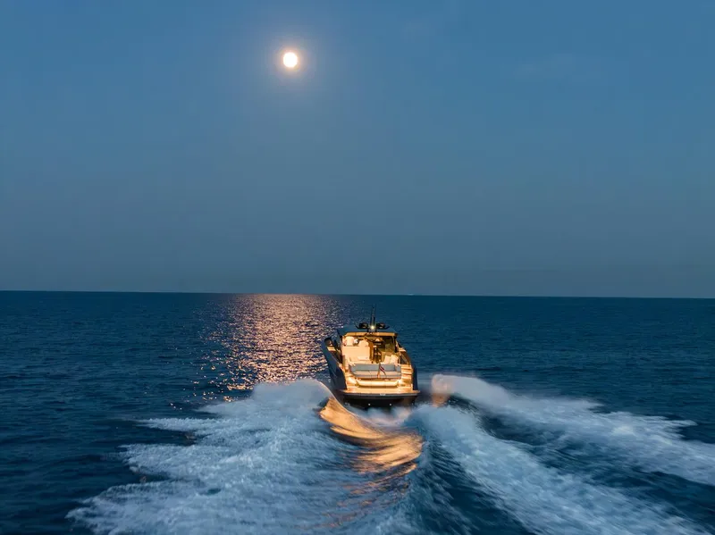 Slide: The Image of Bekkers Yachts Azur 45HT cruising under moonlight on open sea, 2023 model. - 35