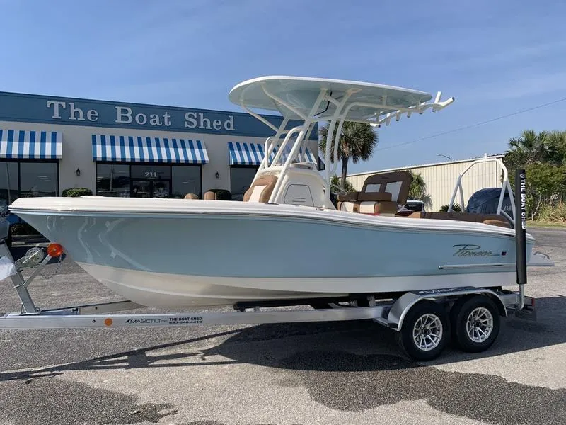 Slide: The Image of 2025 Pioneer ISLANDER 202 boat on trailer outside The Boat Shed. - 0