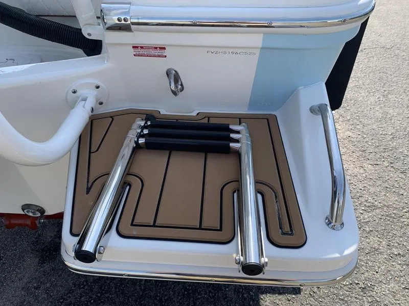 Slide: The Image of 2025 Pioneer ISLANDER 202 boat swim platform with foldable ladder. - 10