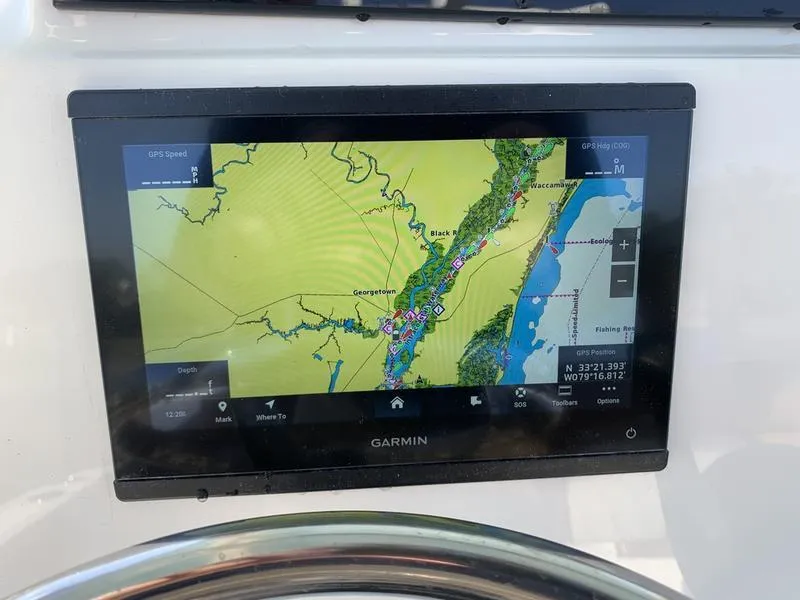 Slide: The Image of Garmin navigation display on 2025 Pioneer ISLANDER 202 boat, showing detailed map. - 22