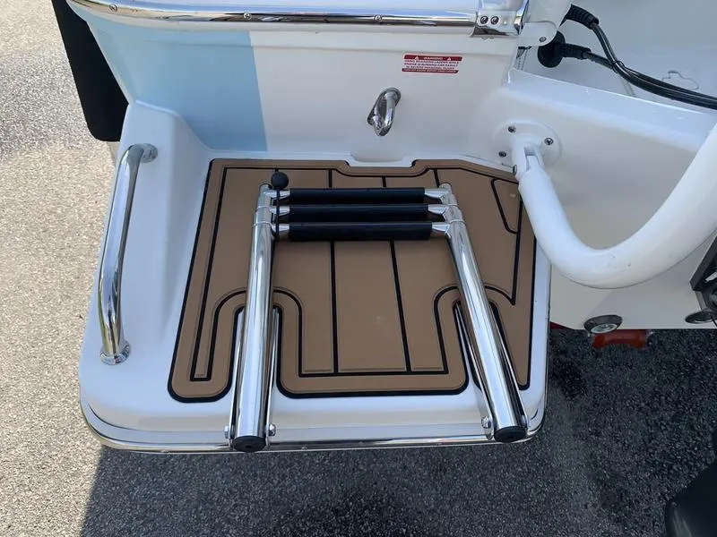 Slide: The Image of Swim platform with ladder on 2025 Pioneer ISLANDER 202 boat. - 9