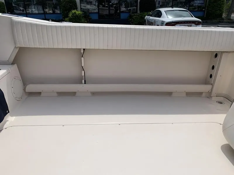 Slide: The Image of 2006 Grady-White 258 Journey boat interior with clean, spacious deck area. - 14