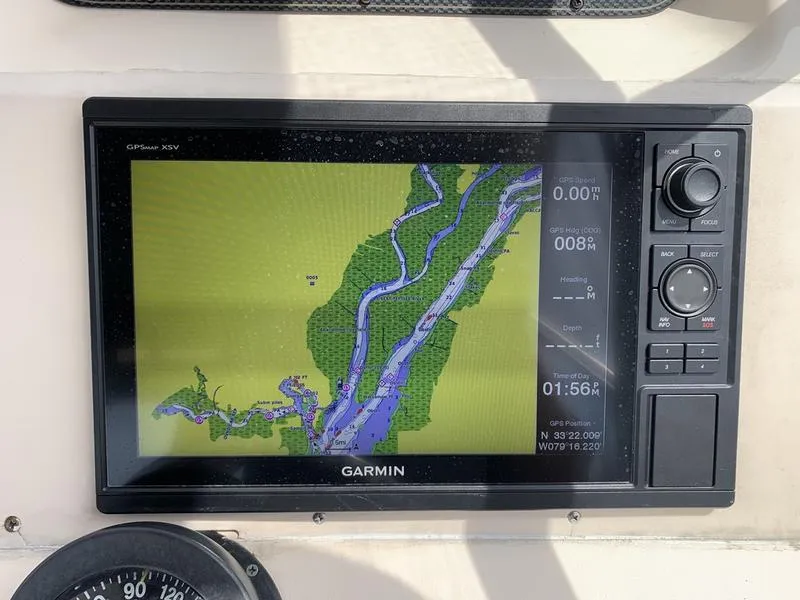 Slide: The Image of Garmin GPS display on 2006 Grady-White 258 Journey boat, showing navigational map. - 22