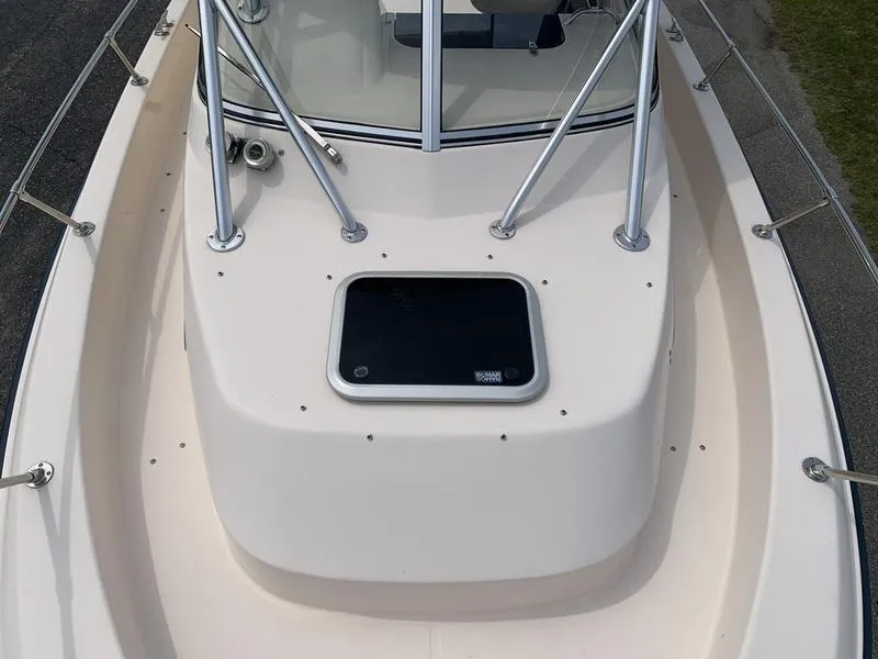 Slide: The Image of 2006 Grady-White 258 Journey boat deck with hatch and railing. - 29