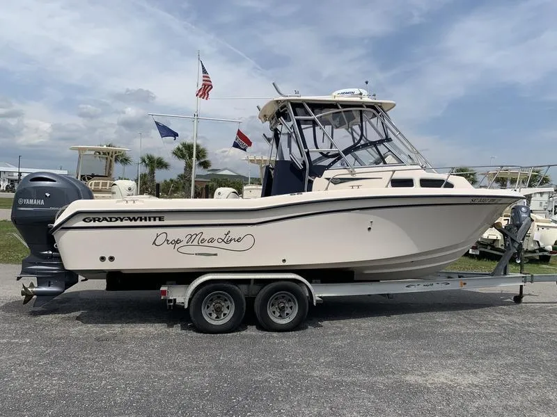 Slide: The Image of 2006 Grady-White 258 Journey boat on trailer, side view, with Yamaha engine. - 5