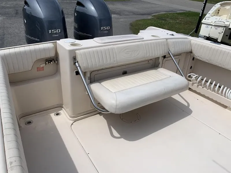 Slide: The Image of 2006 Grady-White 258 Journey boat with foldable seating and twin 150 engines. - 8