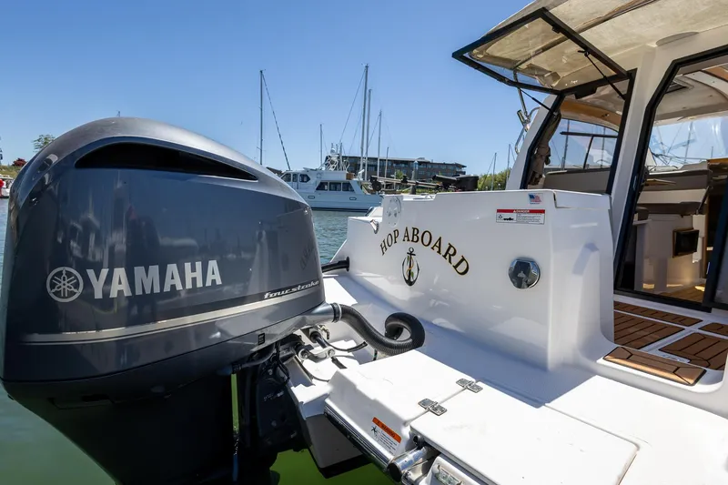Slide: The Image of 2019 Cutwater C-24 Coupe with Yamaha engine, docked at marina. - 16