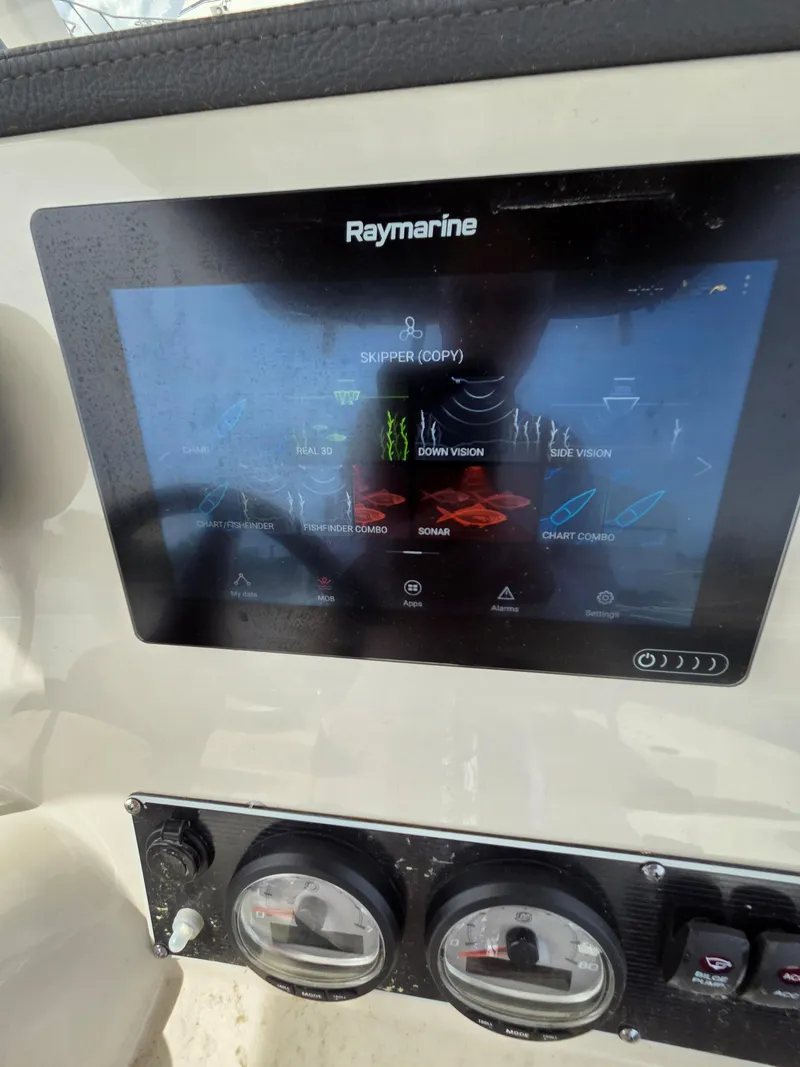 Slide: The Image of Raymarine display on 2019 Boston Whaler 240 Dauntless boat dashboard. - 23