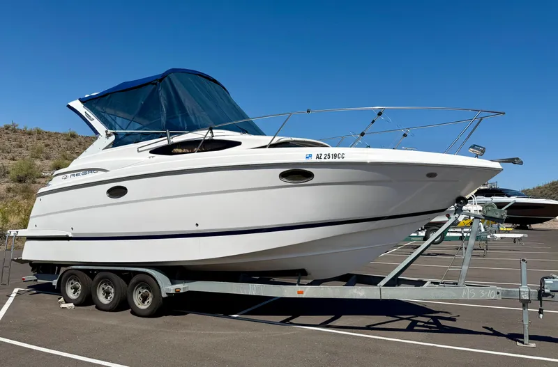 The Image of 2007 Regal 2860 Window Express boat on trailer in parking lot. - 0