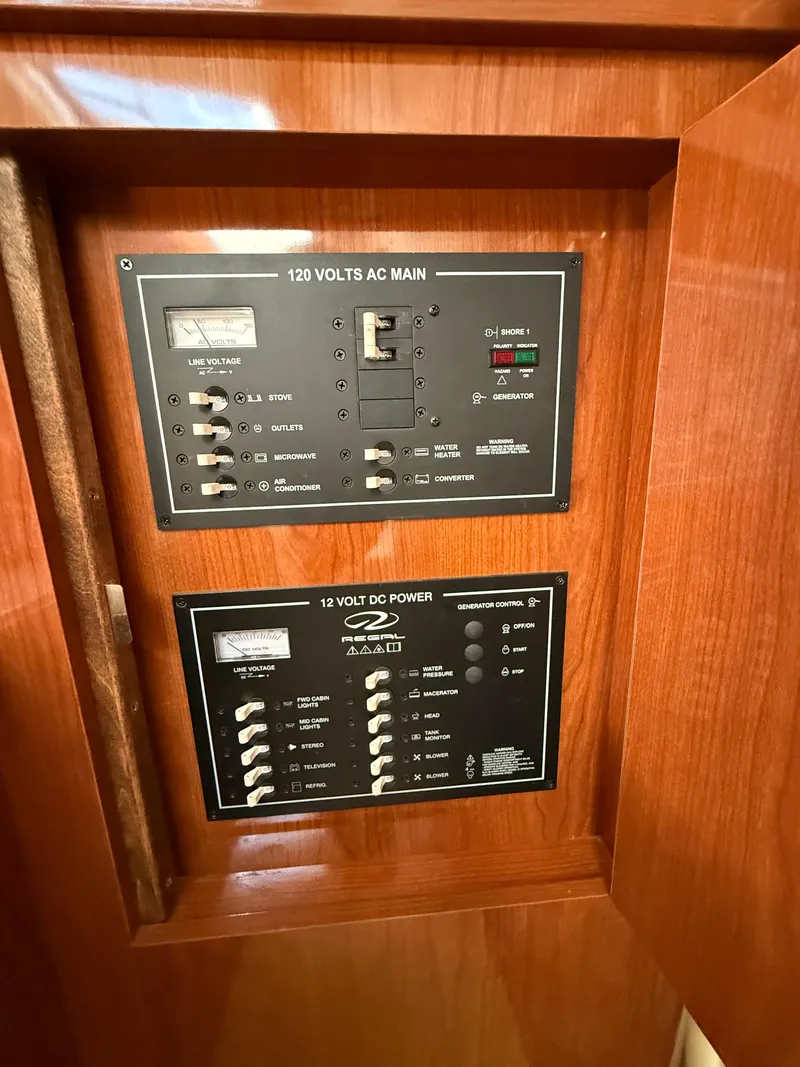 Slide: The Image of Electrical control panel on a 2007 Regal 2860 Window Express boat. - 13