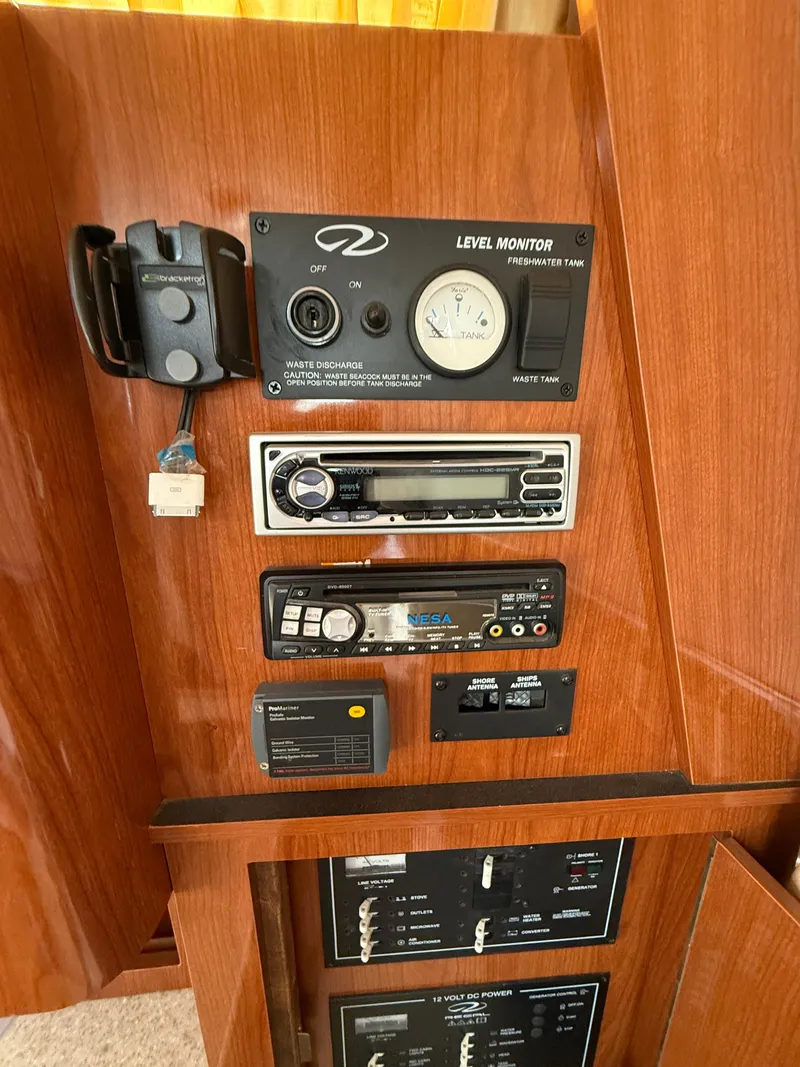 Slide: The Image of Control panel of a 2007 Regal 2860 Window Express boat with various gauges and controls. - 14