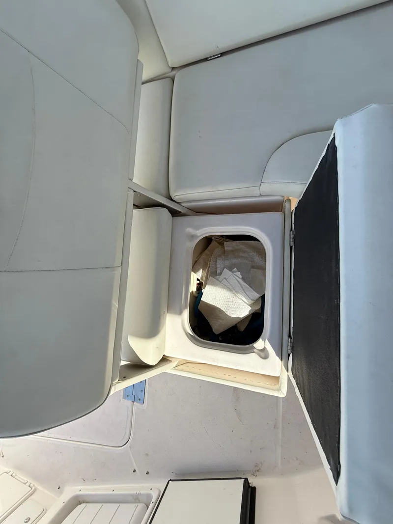 Slide: The Image of 2007 Regal 2860 Window Express boat interior seating and storage compartment. - 28