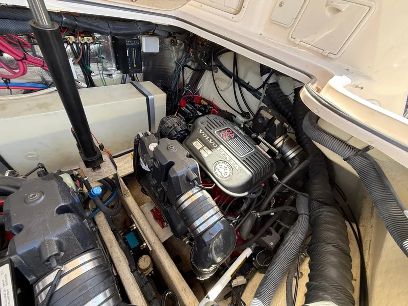Slide: The Image of Engine compartment of a 2007 Regal 2860 Window Express boat, featuring Volvo Penta engines. - 31