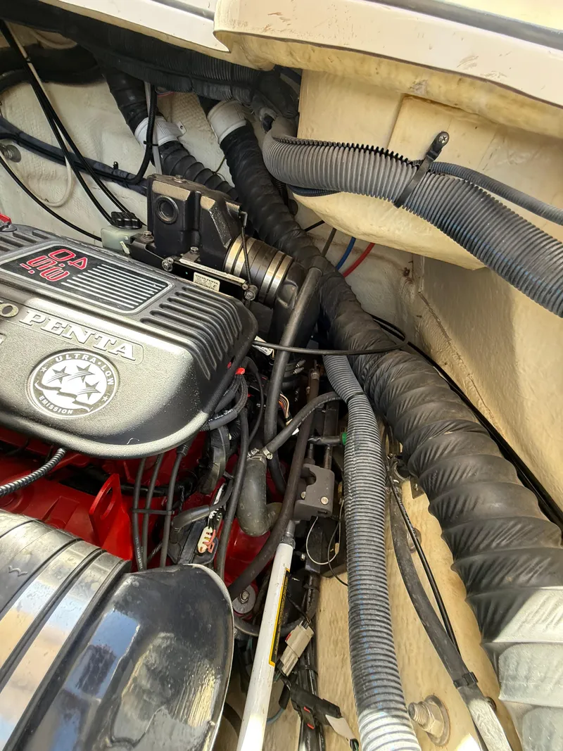 Slide: The Image of Engine compartment of a 2007 Regal 2860 Window Express boat, featuring Volvo Penta components. - 35