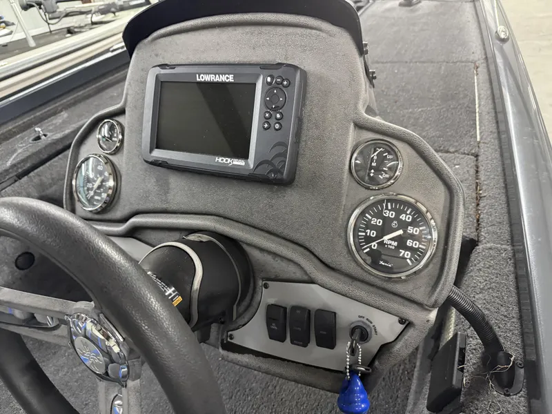Slide: The Image of 2022 Ranger RT178 boat dashboard with Lowrance display and gauges. - 19