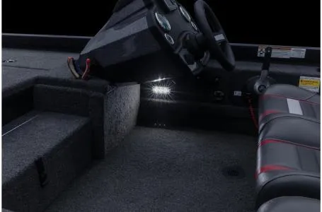 Slide: The Image of 2022 Ranger RT178 boat interior with illuminated dashboard and seating area. - 24