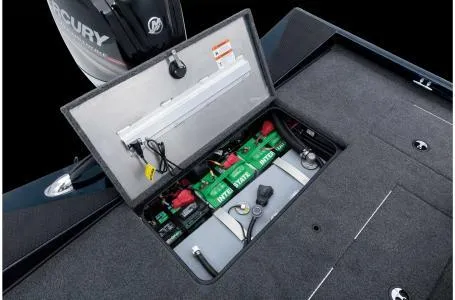 Slide: The Image of 2022 Ranger RT178 boat battery compartment with multiple batteries and wiring. - 29