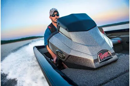 Slide: The Image of Man driving 2022 Ranger RT178 boat on a lake at sunset. - 35