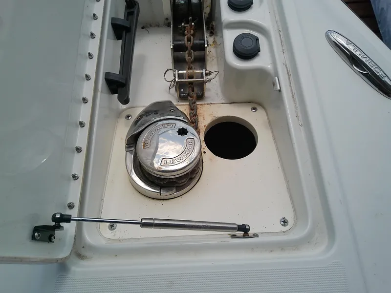 Slide: The Image of 2008 Formula 310 Sun Sport boat anchor winch and chain compartment. - 25