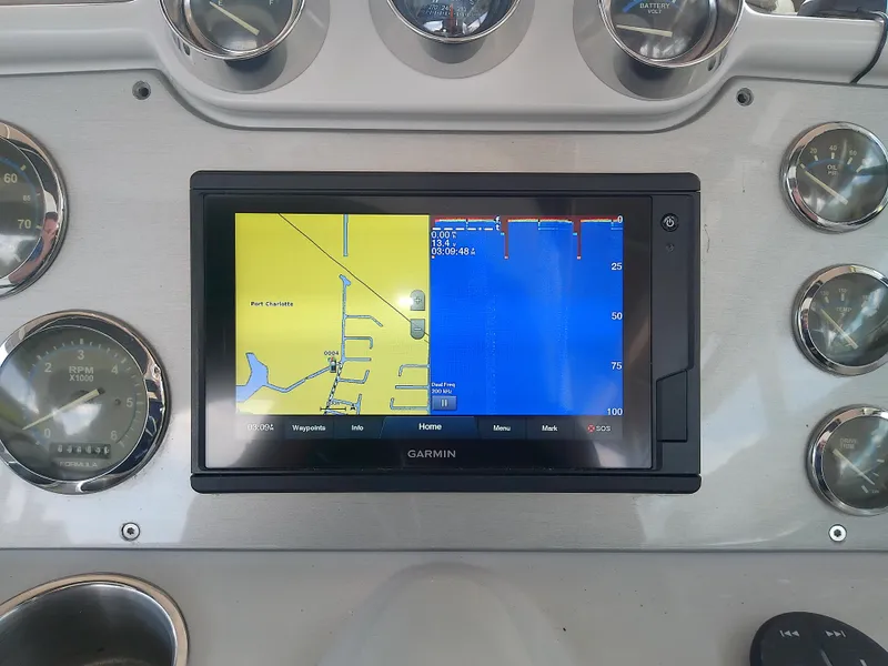Slide: The Image of Garmin navigation system on 2008 Formula 310 Sun Sport boat dashboard. - 17
