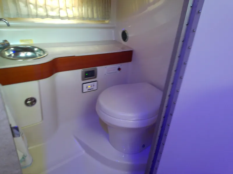 Slide: The Image of 2008 Formula 310 Sun Sport boat bathroom with sink and toilet. - 40