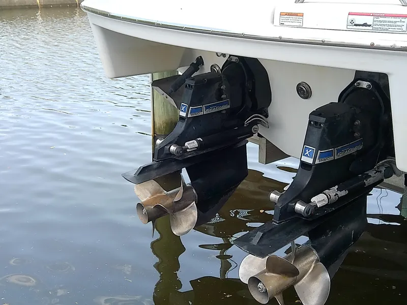 Slide: The Image of 2008 Formula 310 Sun Sport boat with dual outboard motors in water. - 6