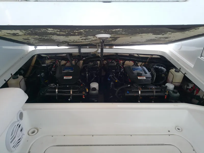 Slide: The Image of 2008 Formula 310 Sun Sport engine compartment with dual engines visible. - 46