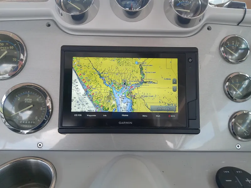 Slide: The Image of Dashboard of 2008 Formula 310 Sun Sport with Garmin navigation display. - 18