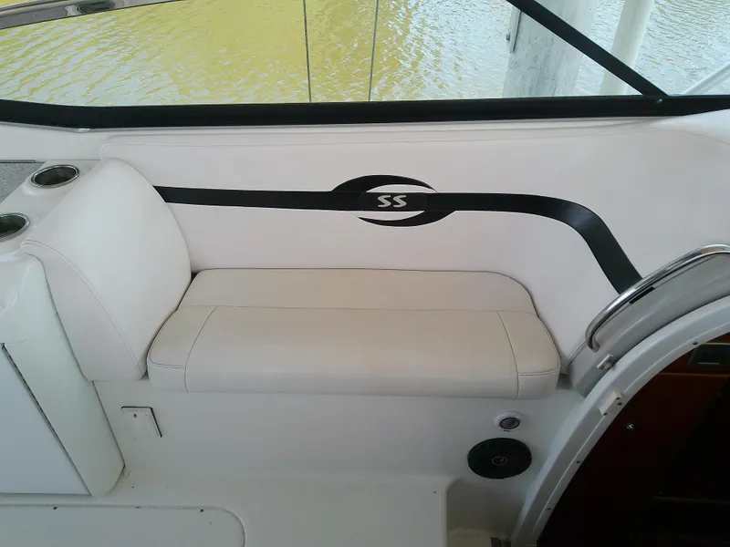 Slide: The Image of 2008 Formula 310 Sun Sport boat interior seating with stylish design and logo. - 14