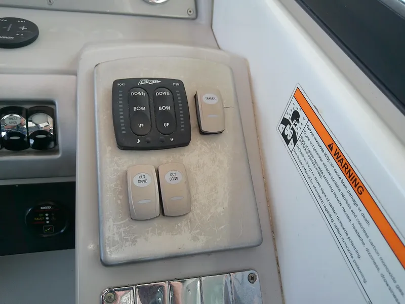Slide: The Image of Control panel of a 2008 Formula 310 Sun Sport boat with warning label. - 22